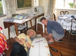 Louie and Roger, Dawn Patrol, helping me pack the board, notice dings from J Bay