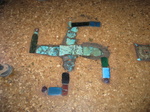 Swastik out of tourquois and jade